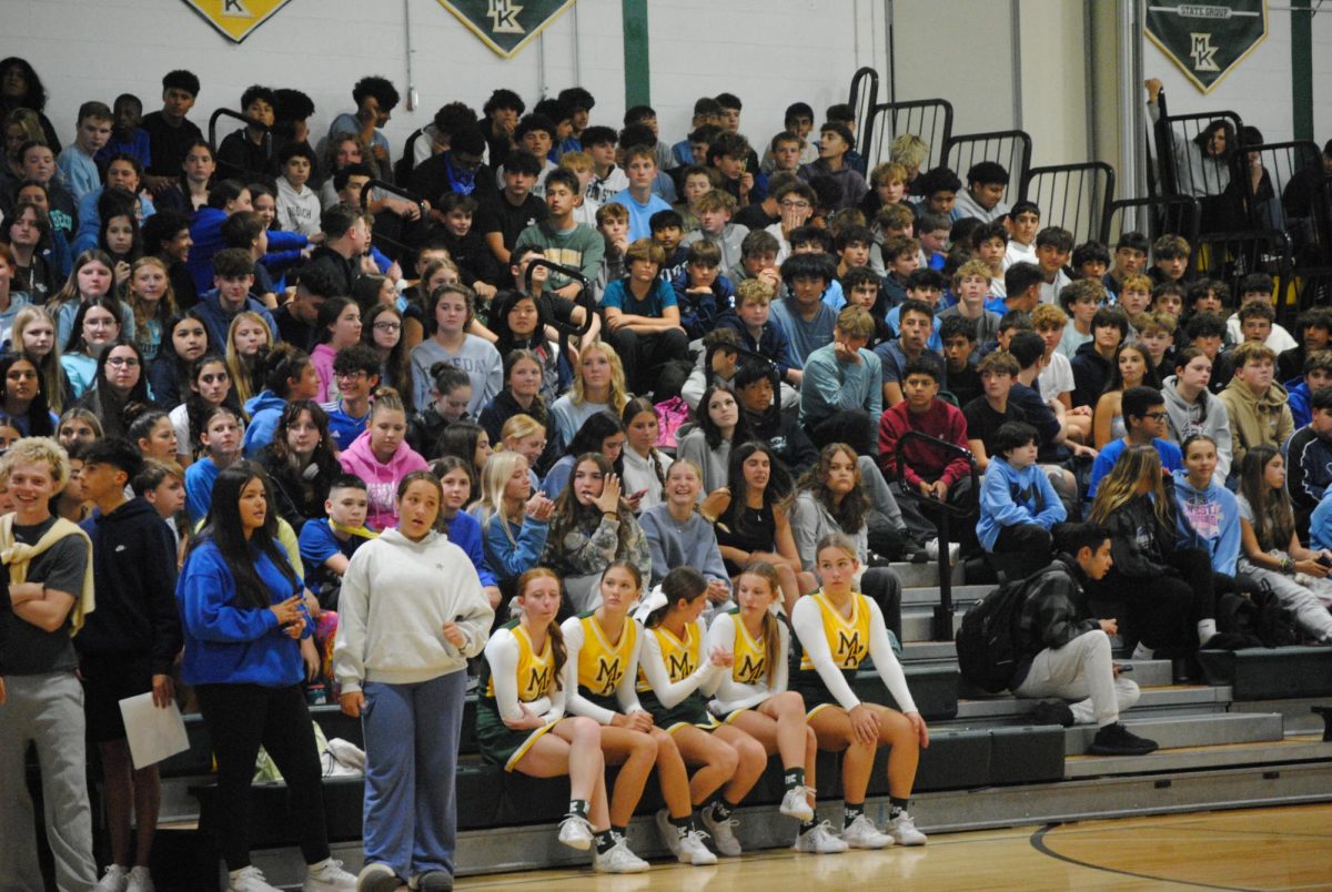 The freshmen are excited to participate in their very first Morris Knolls pep rally, cheering passionately for their fellow classmates.