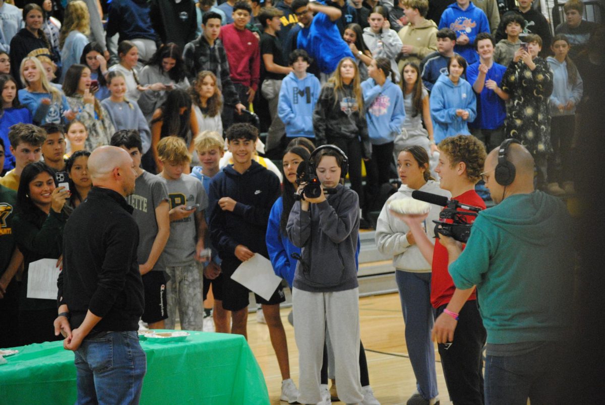 Mr. Mortensen prepares to be pied in the face by sophomore, Caleb Frix, at this year's fall pep rally!
